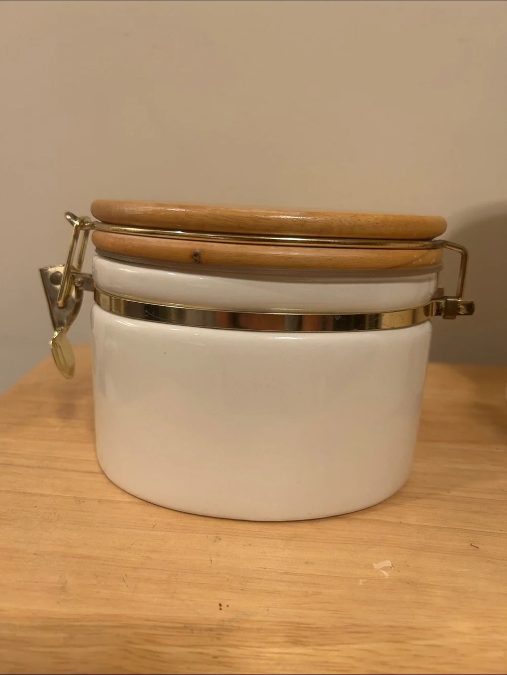Vintage Preferred Stock Embossed Ceramic Kitchen Canister Set with wooden lids.